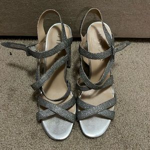 Size 9.5 silver 2 inch Unisa heels